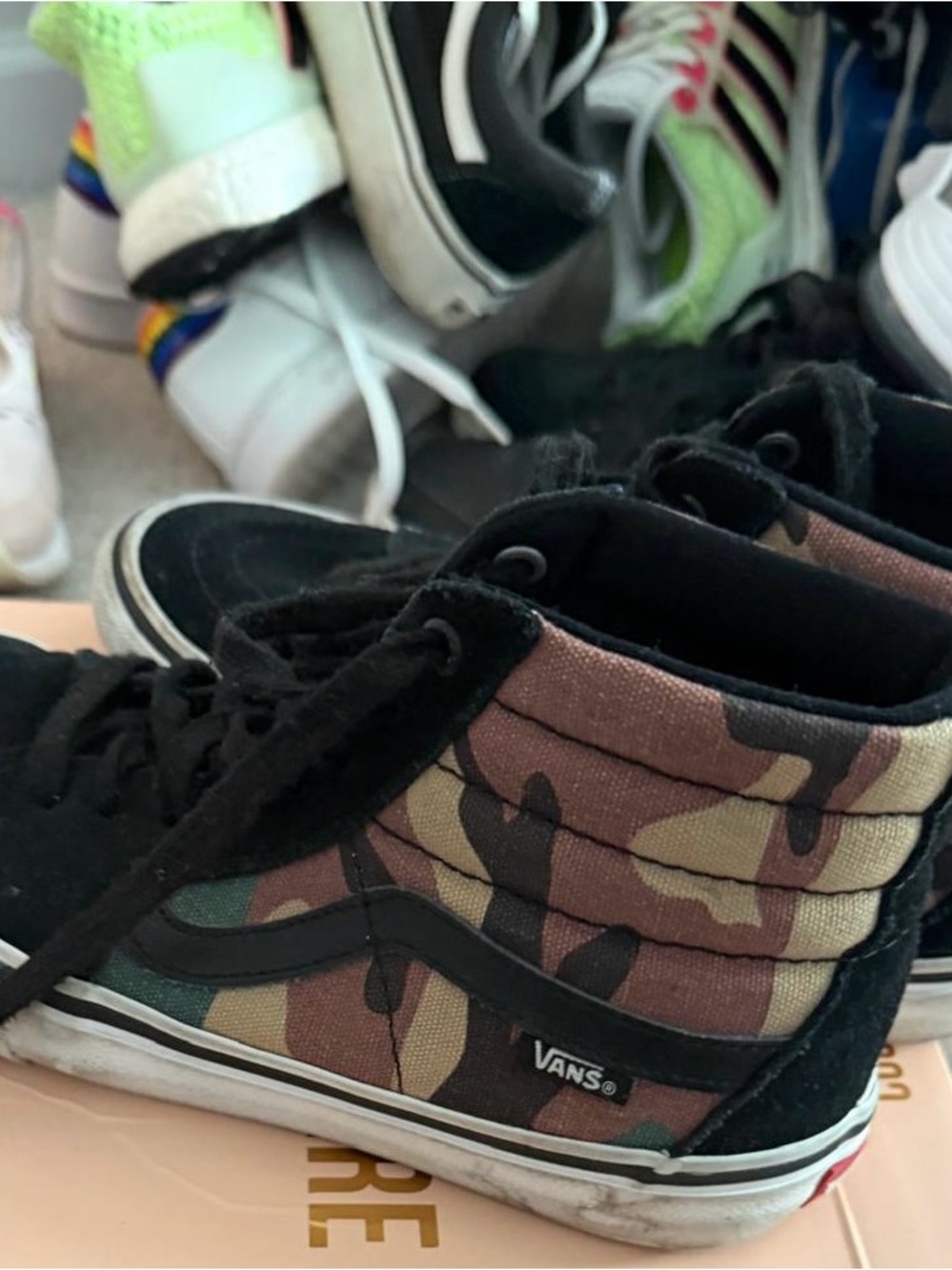 Vans High-Top Sneakers in Black and Camo
